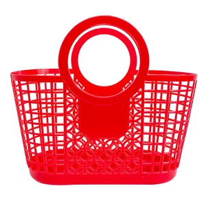 Red hollow plastic beach tote bag for kids featuring vintage-style mesh and round handles