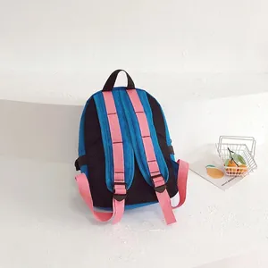 Vibrant blue and pink children backpack with breathable mesh back and adjustable straps