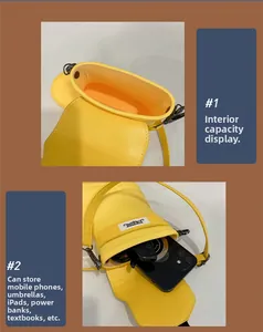 Detail view of yellow rain boot shaped bag showing interior capacity and magnetic closure