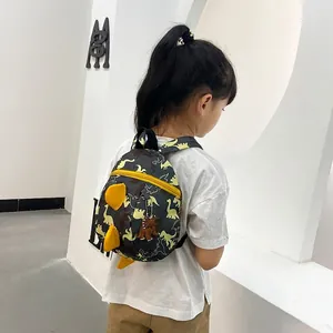 Cute dinosaur print toddler backpack with 3D decorative scales and yellow zipper details