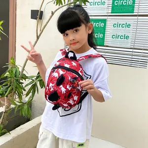 Cute red toddler backpack with white dinosaur patterns and adjustable straps for kids