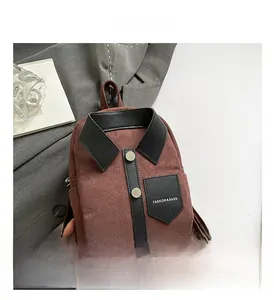 Detailed shot of creative shirt-style backpack with brown matte texture and black leather collar