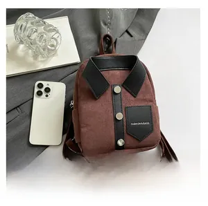 Macro view of mini dark brown suede backpack with creative shirt-collar design details