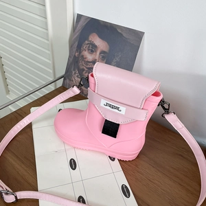 Detailed view of pink rain boot shaped crossbody bag with BEIBAOZI logo and black buckle