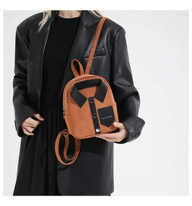 Detail of creative shirt-style mini backpack with collar design and metal buttons
