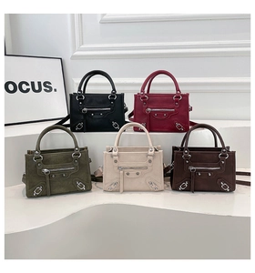 French motorcycle bags in five colors with vintage metal studs and versatile straps