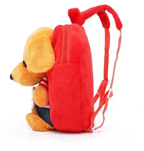 Side view of red plush toddler backpack featuring a cute 3D cartoon dog doll detail