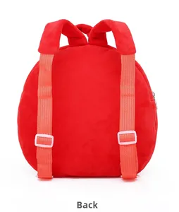 Detail of red plush backpack back featuring adjustable straps and soft texture
