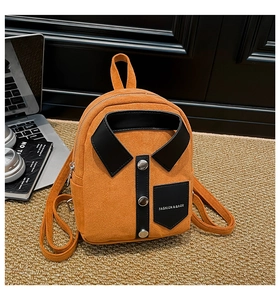 Macro detail of orange suede backpack featuring creative shirt collar and button design
