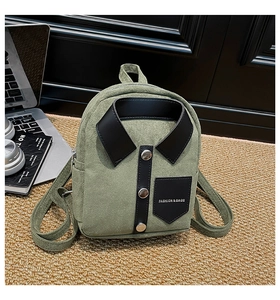 Detail of green suede mini backpack with shirt collar design and metal button decor