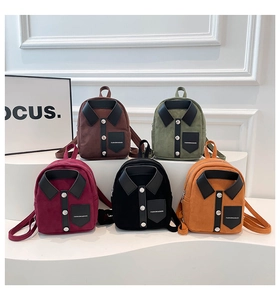 Detail of five colorful suede mini backpacks featuring unique shirt collar and button designs