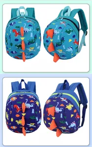 Detail showing toddler dinosaur backpacks with 3D orange fins in light and dark blue colors