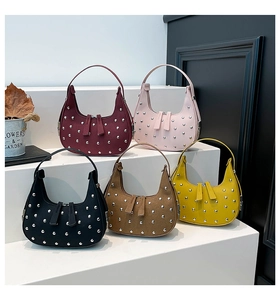 Detailed arrangement of punk style hobo bags with silver studs in five various colors