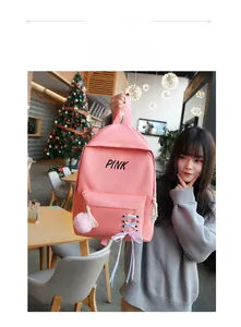 Sac à dos d'école en toile rose avec lettrage PINK, pompons décoratifs et rubans pour filles