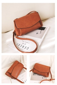 Detail view of the brown minimalist shoulder bag showing the soft matte PU leather texture