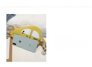 Yellow car-shaped children's corduroy fanny pack size comparison with a phone