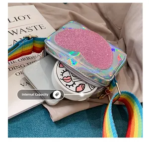 Interior capacity detail of children holographic bag with pink glitter heart and rainbow strap