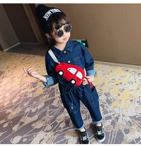 Detail of red cartoon car plush shoulder bag for kids with adjustable strap