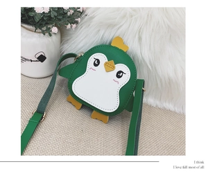 Cute green penguin crossbody bag for kids with white penguin face and yellow beak details