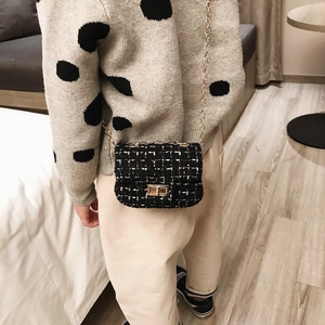 Kids black tweed crossbody bag with gold chain strap and colorful speckle accents
