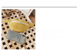 Detailed size comparison of a yellow canvas waist bag next to a smartphone device
