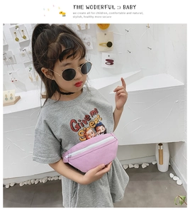 Close-up of pink canvas waist bag with white zipper on a young girl for daily use