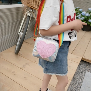 Girl's silver laser crossbody bag with pink sequin heart and rainbow strap
