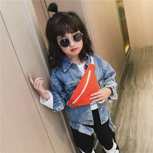 Minimalist kids waist bag in bright orange fabric worn by a young child model