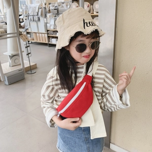 Kids red canvas fanny pack with white zipper and crossbody strap for stylish girls