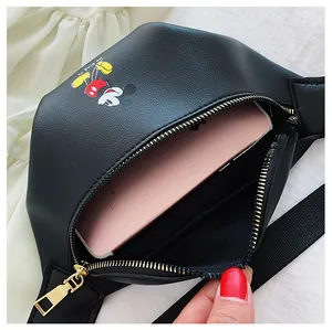 Detail view of internal storage capacity for black children's cartoon print chest bag