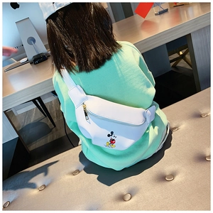 Detailed view of kids white Mickey Mouse chest bag with zipper and cartoon print