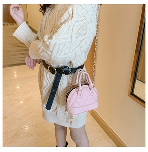 Pink mini shell bag for kids with diamond quilted pattern and gold chain strap detail
