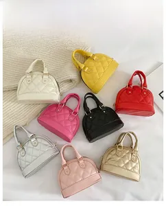 Detailed grid of eight colorful mini quilted shell bags for kids in various vibrant shades