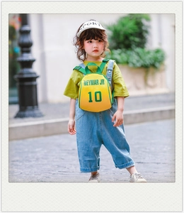 Detail of yellow and green mini backpack with Neymar JR 10 sports print for kids