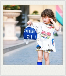Detail of blue mini backpack for kids featuring Pirlo 21 print and vibrant summer style