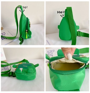 Detailansicht der Vorder- und Rückseite sowie des Innenfachs der grünen Dino-Kindertasche