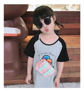 Kid's pink and green mini crossbody bag styled with a printed t-shirt and sunglasses