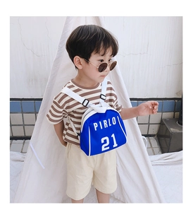 Detailed view of child wearing a blue mini backpack with Pirlo 21 logo on white background