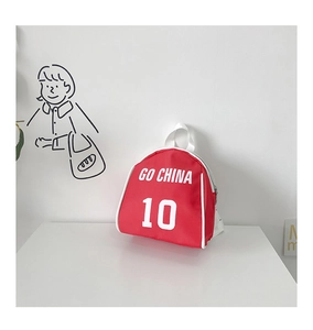Close-up of a red mini toddler backpack featuring GO CHINA print and durable canvas texture