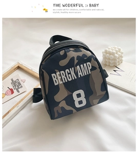 Detail of kids nylon camouflage backpack with sports soccer element and number 8 print