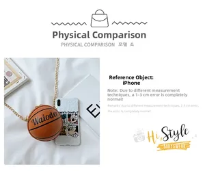 Detailed size comparison of basketball-shaped cross-body bag next to a smartphone