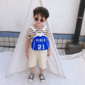 Blue kids sports backpack with white PIRLO 21 print worn by a young boy in a studio