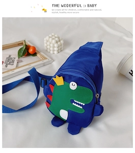 Detail of blue dinosaur kids chest bag with adjustable strap and waterproof nylon fabric