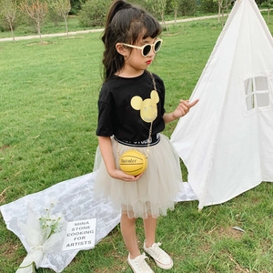 Kids basketball purse paired with summer cartoon shirt and gray tutu skirt on grass