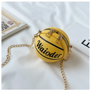 Close-up of yellow basketball bag with realistic texture and gold chain strap