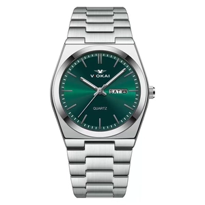 Detail of green sunray dial on men's quartz watch showing day and date window