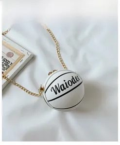 Detail of white basketball shaped crossbody bag for girls with gold chain strap