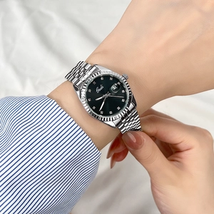 Orologio elegante da donna in acciaio argento con quadrante verde e datario