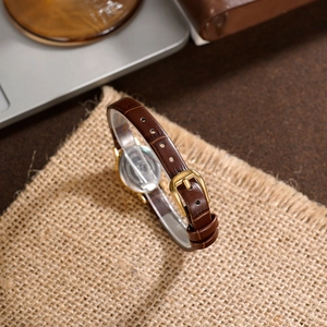 Elegant vintage small oval quartz watch for women with brown leather strap and gold case