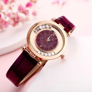 Macro detail of purple quartz watch with rose gold case and sparkling crystal accents